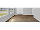 Neutral bedroom featuring hardwood flooring, a large window and view of other properties at 1368 Palm Springs Paloma Dr, Longs, SC 29568