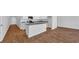 Kitchen area with an island with granite countertops, stainless sink and open space at 1368 Palm Springs Paloma Dr, Longs, SC 29568