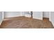 A spacious living room with wood-look flooring and modern interior design at 1368 Palm Springs Paloma Dr, Longs, SC 29568