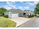 Charming home featuring an attached garage and fenced backyard, complete with a paved driveway at 1400 James Island Ave., North Myrtle Beach, SC 29582