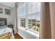 Bedroom view overlooking a pool and nearby buildings, highlighting the property's amenities and location at 142 Ella Kinley Circle # 402, Myrtle Beach, SC 29588