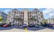 Beautiful condominium complex showcasing palm trees and ample parking spaces at 142 Ella Kinley Circle # 402, Myrtle Beach, SC 29588