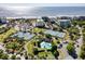 Aerial of community featuring tennis courts, pool and beach access with ocean views at 14290 Ocean Highway # 222, Pawleys Island, SC 29585