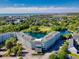 Aerial view of building complex, showcasing waterfront and nearby cityscape at 14290 Ocean Highway # 222, Pawleys Island, SC 29585