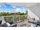 Spacious balcony with beautiful views of mature trees and a tranquil waterfront setting at 14290 Ocean Highway # 222, Pawleys Island, SC 29585