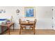 Cozy dining area features a wooden table with seating for two, adjacent to the kitchen at 14290 Ocean Highway # 222, Pawleys Island, SC 29585