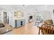 Open living space with a kitchen, living, and dining area, offering seamless flow and modern amenities at 14290 Ocean Highway # 222, Pawleys Island, SC 29585