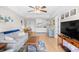Well-lit living space showcasing a kitchen, living, and dining area with coordinated furnishings at 14290 Ocean Highway # 222, Pawleys Island, SC 29585