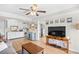Bright living space with a kitchen, living, and dining area featuring wood-look floors and natural light at 14290 Ocean Highway # 222, Pawleys Island, SC 29585
