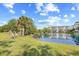 Community playground next to a tranquil pond with views of the condominiums at 14290 Ocean Highway # 222, Pawleys Island, SC 29585
