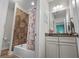 Cozy bathroom featuring tub/shower combination with modern vanity and fixtures, plus accent decor at 1470 Suncrest Dr., Myrtle Beach, SC 29577