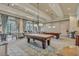 Spacious game room featuring pool tables, comfortable seating, and stylish decor at 1470 Suncrest Dr., Myrtle Beach, SC 29577