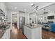 Spacious kitchen flows to the living room, boasting stainless appliances and a large island at 1470 Suncrest Dr., Myrtle Beach, SC 29577