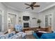 Bright living space featuring hardwood floors, a fireplace, and an open layout with natural light at 1470 Suncrest Dr., Myrtle Beach, SC 29577