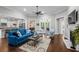 Bright living room with hardwood floors, stylish seating, and a cozy fireplace, perfect for entertaining at 1470 Suncrest Dr., Myrtle Beach, SC 29577