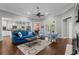 Open-concept living room with hardwood floors and a seamless flow to the kitchen and dining areas at 1470 Suncrest Dr., Myrtle Beach, SC 29577