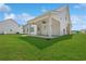 Spacious backyard and covered patio, ideal for outdoor living at 1503 Red Bluff Rd., Loris, SC 29569