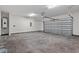 Garage features modern garage door and ample empty space at 1503 Red Bluff Rd., Loris, SC 29569
