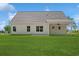 This home features a well-maintained lawn and covered patio for relaxing outdoor living at 1503 Red Bluff Rd., Loris, SC 29569