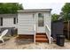Exterior view of a shed and the backyard with steps leading to a door at 1521 Front St., Georgetown, SC 29440