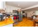 Bright kitchen with stainless steel appliances and wood countertops opens to the living area at 1521 Front St., Georgetown, SC 29440