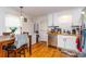Bright kitchen featuring white cabinets, stainless steel appliances, butcher block countertops, and hardwood floors at 1521 Front St., Georgetown, SC 29440
