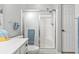 Well-lit bathroom showcasing a glass-door shower with tiled walls and updated fixtures at 1525 Lanterns Rest Rd. # 103, Myrtle Beach, SC 29579