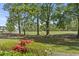 Landscaped view of golf course featuring colorful flowers and manicured lawn at 1525 Lanterns Rest Rd. # 103, Myrtle Beach, SC 29579