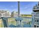 Scenic balcony featuring outdoor seating and picturesque ocean and community views at 156 Via Old Sound Blvd. # C, Ocean Isle Beach, NC 28469