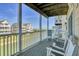 Charming balcony providing stunning water views and comfortable rocking chairs at 156 Via Old Sound Blvd. # C, Ocean Isle Beach, NC 28469