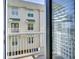 Balcony with a view of another building and a glimpse of sunlight shining through the blinds at 156 Via Old Sound Blvd. # C, Ocean Isle Beach, NC 28469
