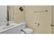 Functional bathroom featuring a single sink vanity, toilet, and shower at 156 Via Old Sound Blvd. # C, Ocean Isle Beach, NC 28469
