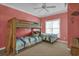 Coastal-themed bedroom with bunk beds and twin bed by the window at 156 Via Old Sound Blvd. # C, Ocean Isle Beach, NC 28469
