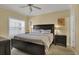 Spacious bedroom with a ceiling fan, a large bed, and plenty of natural light at 156 Via Old Sound Blvd. # C, Ocean Isle Beach, NC 28469
