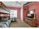 Cozy bedroom featuring nautical decor, bunkbeds and a dresser with TV at 156 Via Old Sound Blvd. # C, Ocean Isle Beach, NC 28469