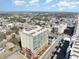 An aerial perspective showcases the building amidst a network of roads, highlighting its urban setting at 1707 Perrin Dr. # 1003, North Myrtle Beach, SC 29582