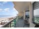 Enjoy the ocean view from this balcony with chairs at 1707 Perrin Dr. # 1003, North Myrtle Beach, SC 29582