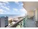 Balcony featuring ocean views, seating and glass railing at 1707 Perrin Dr. # 1003, North Myrtle Beach, SC 29582
