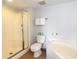 Bright bathroom featuring a glass shower and a corner soaking tub for a luxurious experience at 1707 Perrin Dr. # 1003, North Myrtle Beach, SC 29582