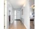 Hallway featuring tile floor, shoe rack and art with views of bedroom and main entrance at 1707 Perrin Dr. # 1003, North Myrtle Beach, SC 29582