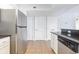Spacious kitchen features stainless steel appliances and ample cabinet space at 1707 Perrin Dr. # 1003, North Myrtle Beach, SC 29582