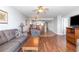 Open concept living and dining area with modern kitchen appliances and hardwood floors at 1707 Perrin Dr. # 1003, North Myrtle Beach, SC 29582