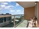 Enjoy ocean views from this unit's cozy balcony with comfortable seating and beautiful, clear-glass railings at 1707 Perrin Dr. # 802, North Myrtle Beach, SC 29582