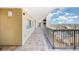 Exterior condo hallway offering a tiled walkway and views of the surrounding neighborhood at 1707 Perrin Dr. # 802, North Myrtle Beach, SC 29582