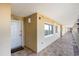 Condo hallway with tile flooring and a unit entrance door with '802' signage at 1707 Perrin Dr. # 802, North Myrtle Beach, SC 29582