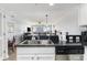 Modern kitchen with granite countertops and open floor plan at 1707 Perrin Dr. # 802, North Myrtle Beach, SC 29582