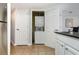Convenient in-unit stacked washer and dryer, located off the kitchen, provide ease for laundry needs at 1707 Perrin Dr. # 802, North Myrtle Beach, SC 29582