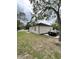 View of home exterior with black car parked in driveway at 1795 Hemingway St., Conway, SC 29527