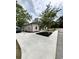 Exterior view of a home featuring manicured landscaping and a large driveway at 1795 Hemingway St., Conway, SC 29527