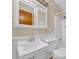 Bright bathroom featuring a clean white sink and tub with modern fixtures at 1907 Rose St., Conway, SC 29527